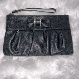 Black wristlet with bow accent